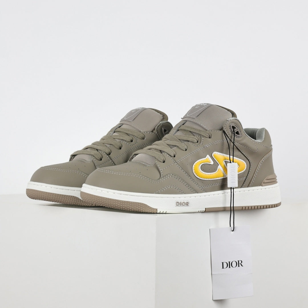 B57 Low-Top Sneakers in Taupe with Yellow CD Signature