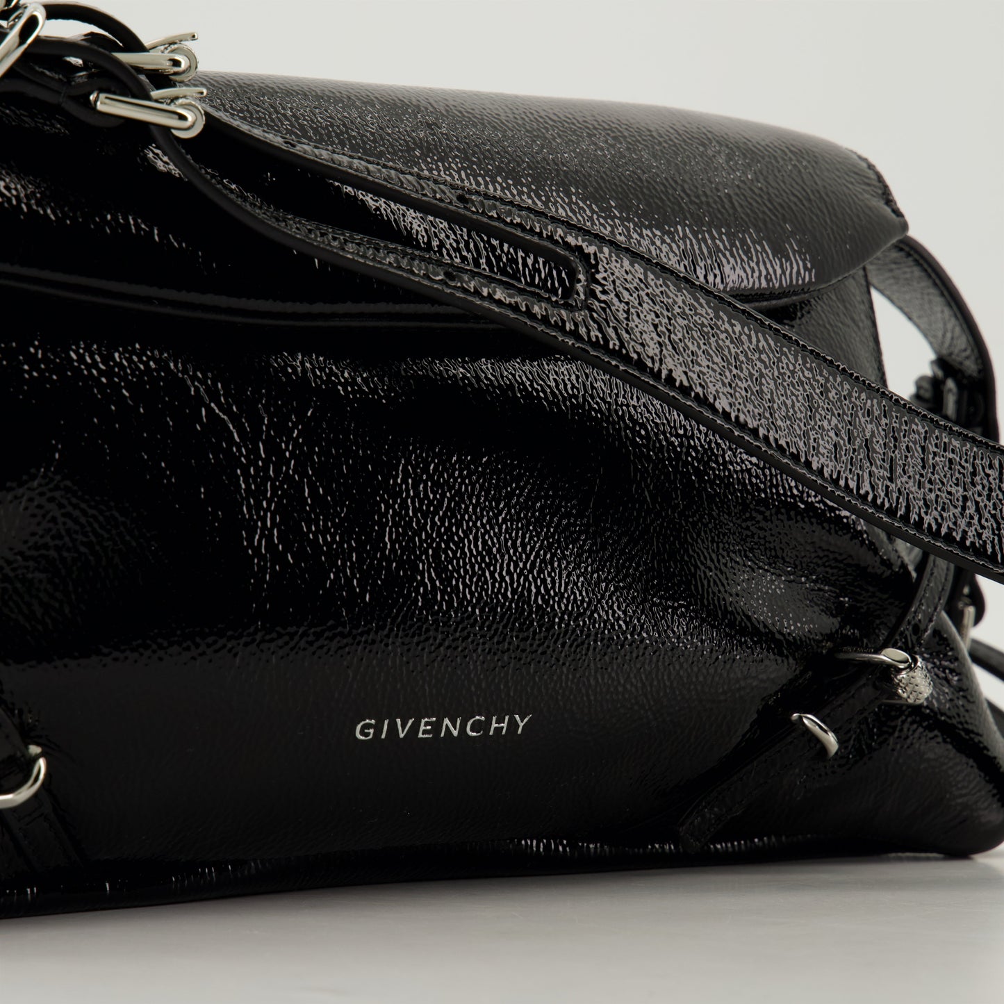 Black Patent Leather Shoulder Bag with Strap Detail