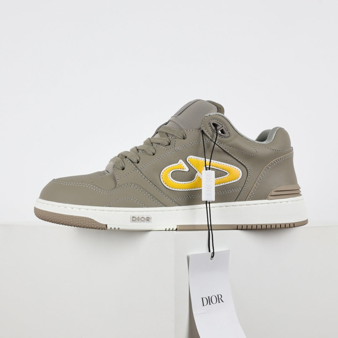 B57 Low-Top Sneakers in Taupe with Yellow CD Signature