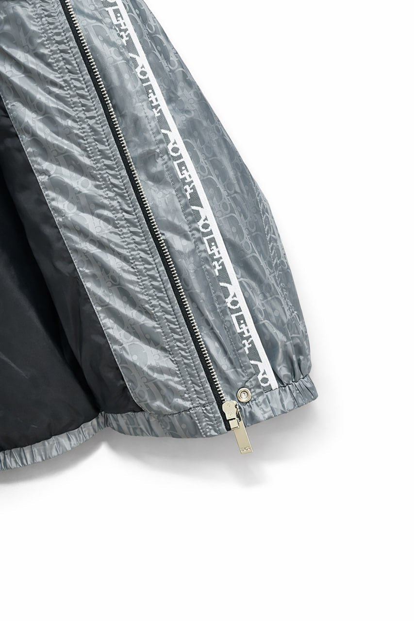 Oblique Grey Hooded Windbreaker with Signature Tape