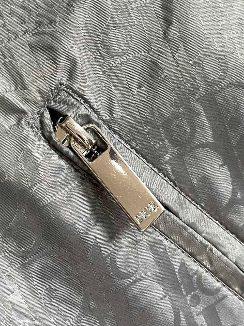 Oblique Grey Hooded Windbreaker with Signature Tape